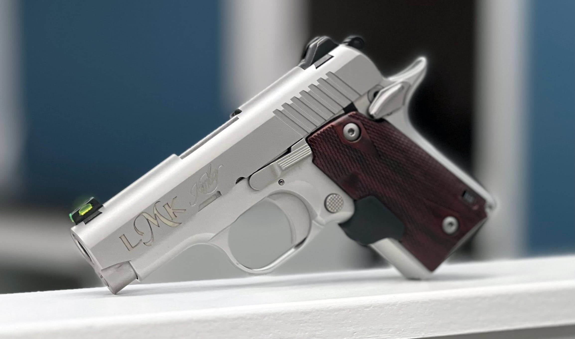 Kimber Micro 9 compact pistol with custom laser engraved lettering on stainless steel slide